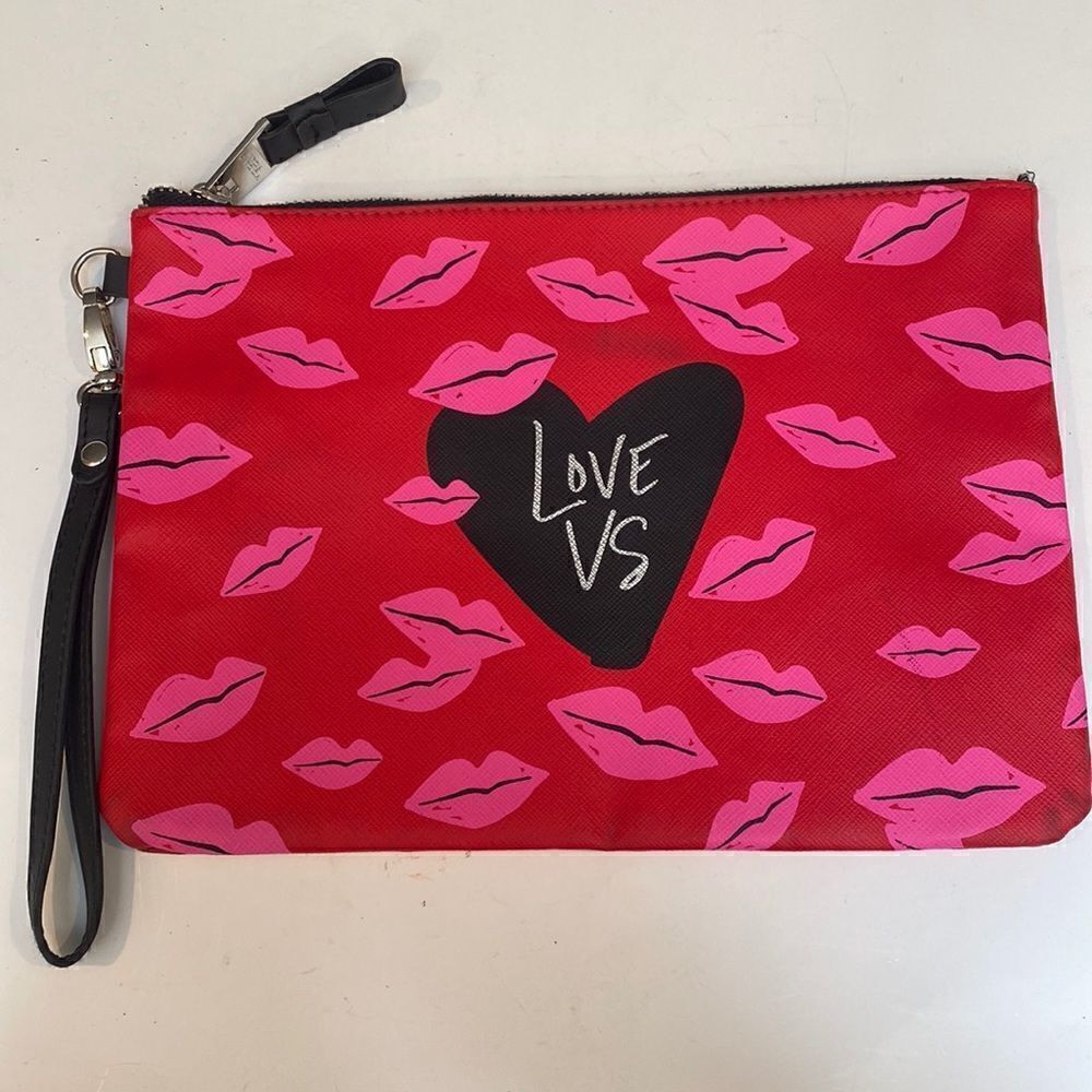 Red coated canvas Victoria’s Secret large wristlet make up bag